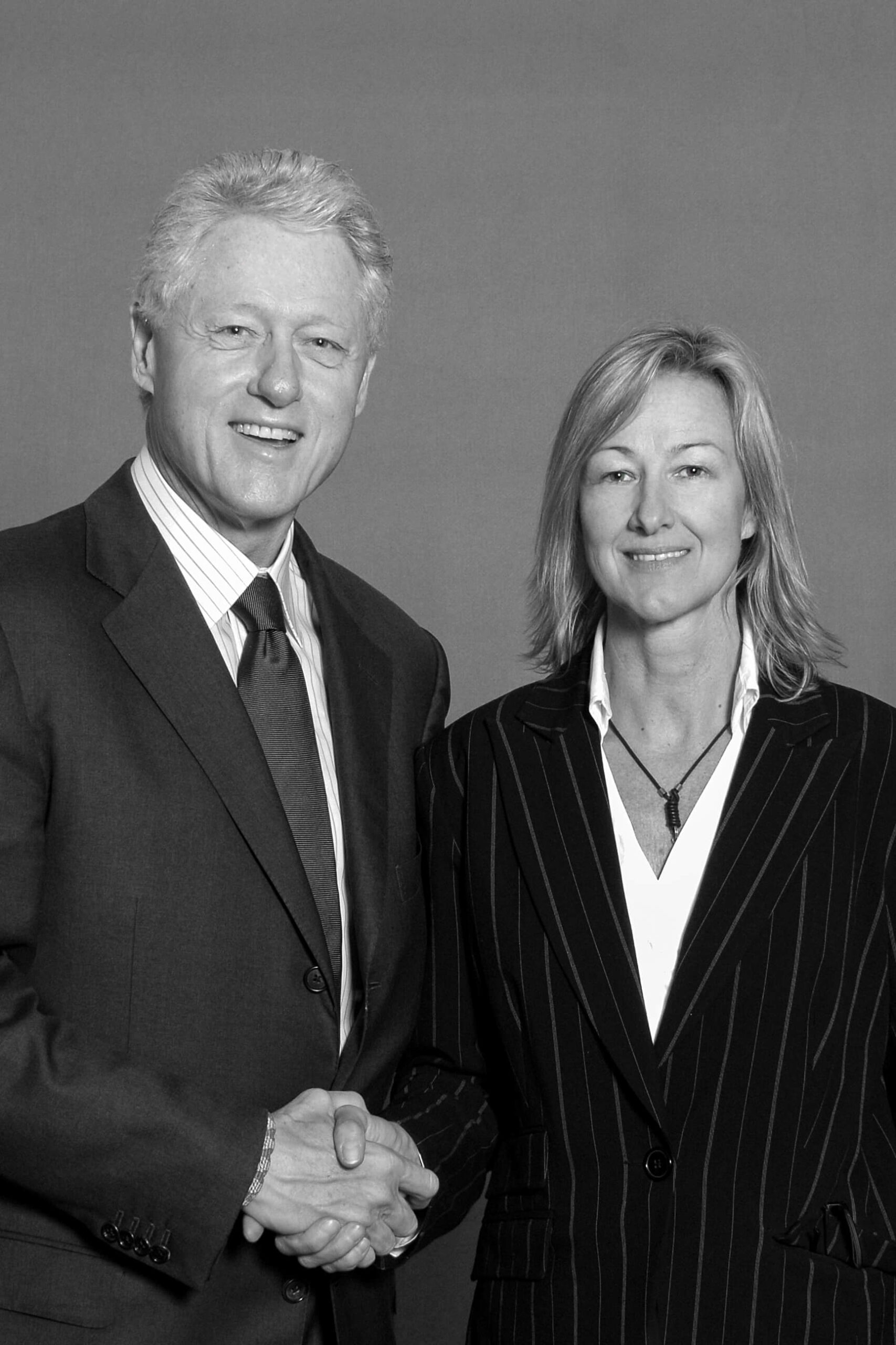 Former US president Bill Clinton poses with photographer Hetty Zantman during a World Economic Forum conference at the CTICC in Cape Town, South Africa.