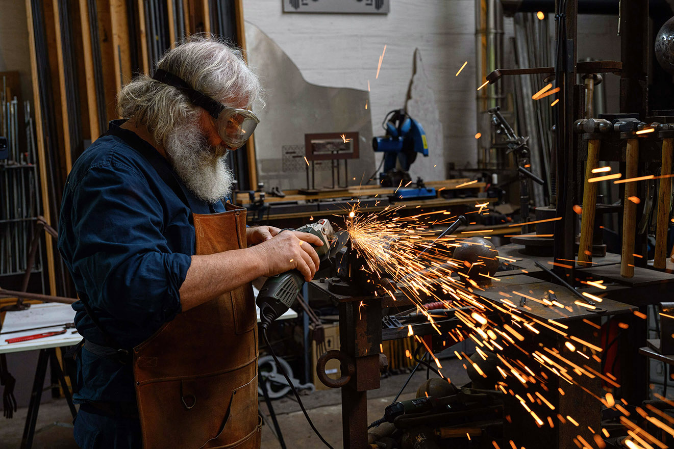 Wolfgang Oude Hengel, sculptor, working in his studio in Mönchengladbach, Germany.